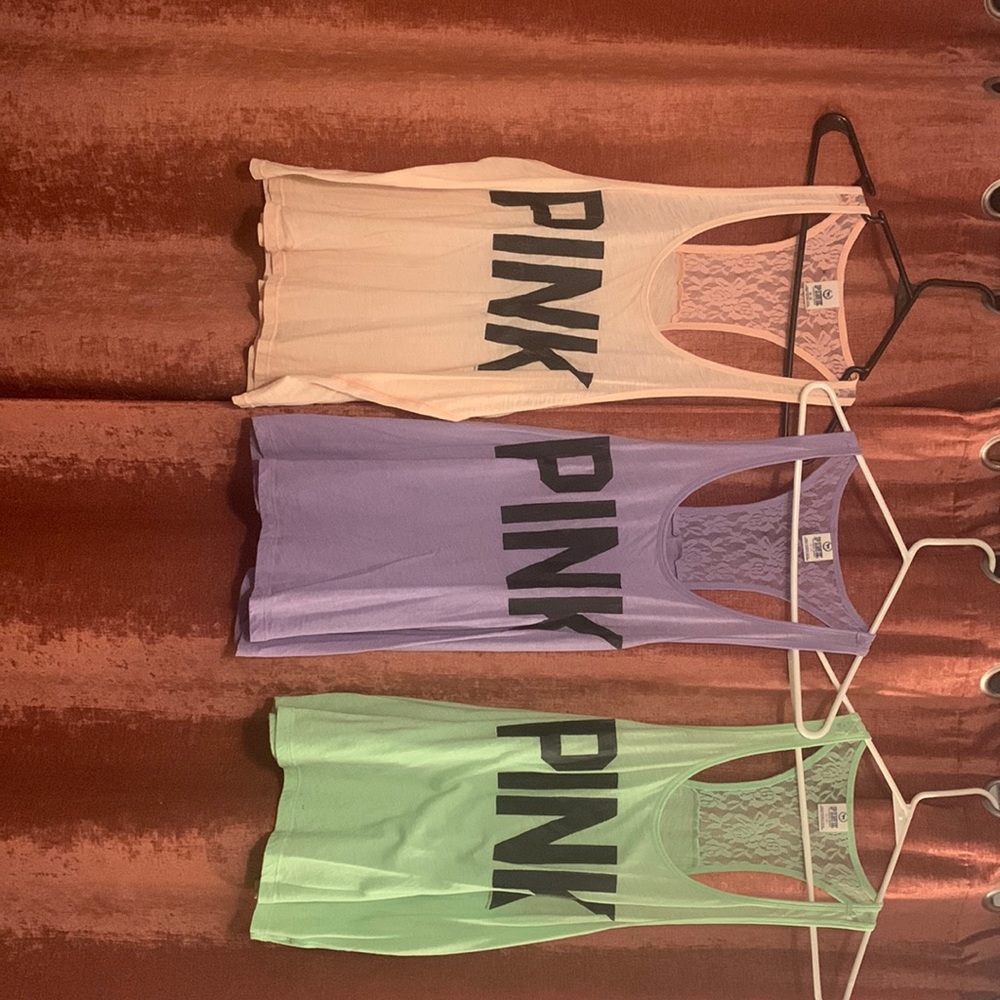 Pastel pink, purple, and mint green VS Pink brand medium tank tops, lace back.